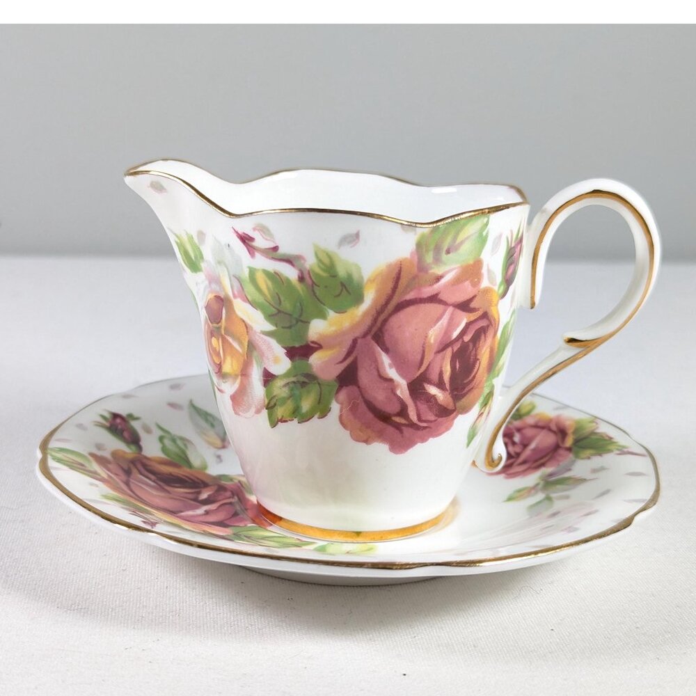 Vintage Paragon Golden Emblem Individual Creamer and saucer, double warrant